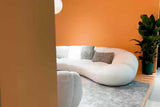 Side perspective of Big Cloud white soft fur fabric sectional