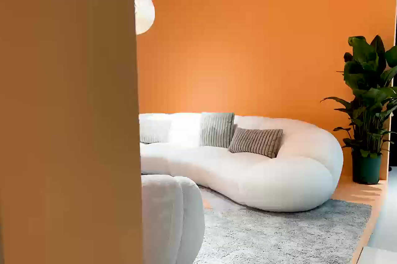 Side perspective of Big Cloud white soft fur fabric sectional