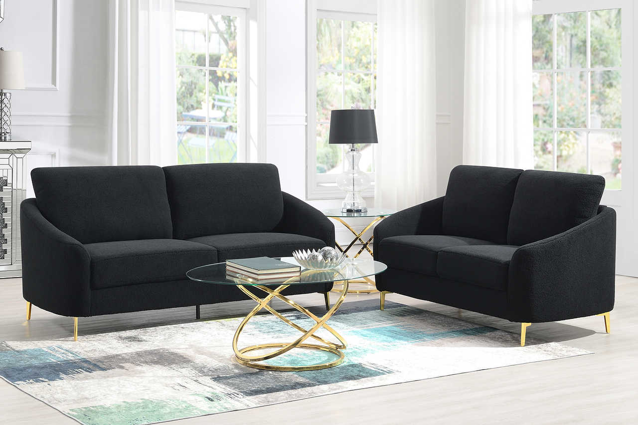 Side view of Lila Black living room set sofa and loveseat
