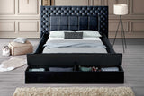 Close-up of tufted black upholstered headboard