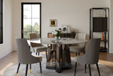 Side view of Luxe round dining table showcasing grey faux marble surface