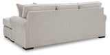 Close-up detail of sofa chaise arm and upholstery