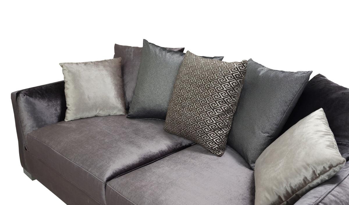 Side close-up of armrest on Skylar gray velvet loveseat