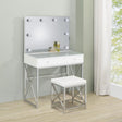 Close-up of Hollywood lighted mirror with dimmer switch
