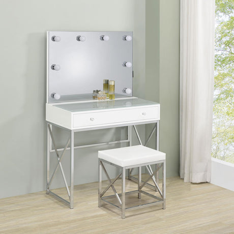 Close-up of Hollywood lighted mirror with dimmer switch