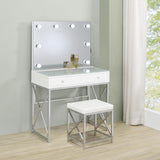 Side view of vanity table with drawer open showing compartments