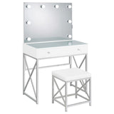 Backless stool with white padded faux leather seat and metal X-braced legs