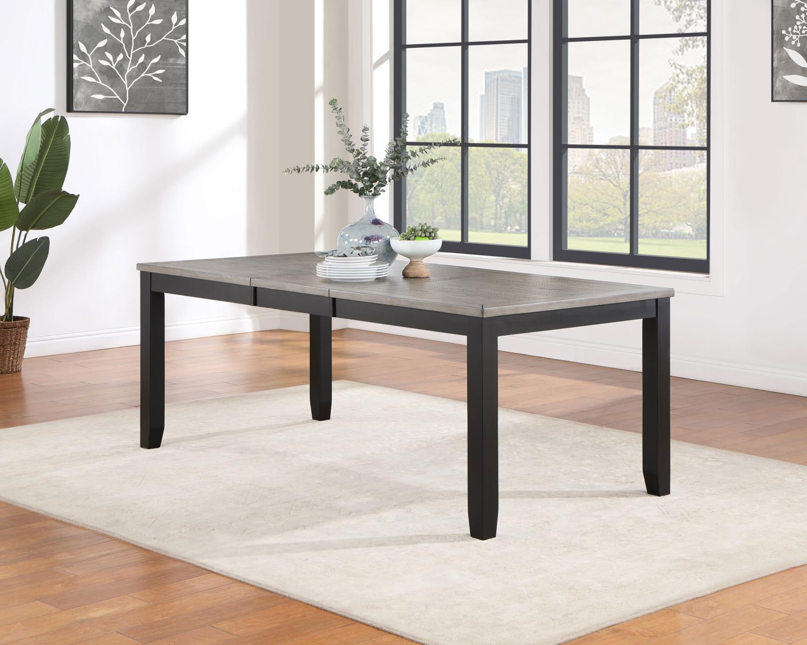 Close-up of grey acacia veneer tabletop and black base