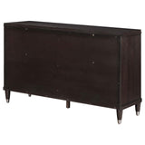Dresser top decorated with framed photos