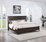 Side view of Emberlyn Queen Four-Poster Bed with iron post accents