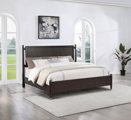 Side view of Emberlyn Queen Four-Poster Bed with iron post accents