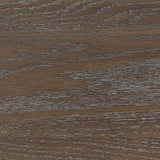 Detailed view of wire-brushed distressing on walnut frame