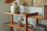 Fayemour console table staged with decorative accents