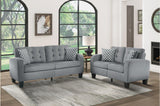 Side view of Sinclair Gray Fabric Tufted Living Room Set