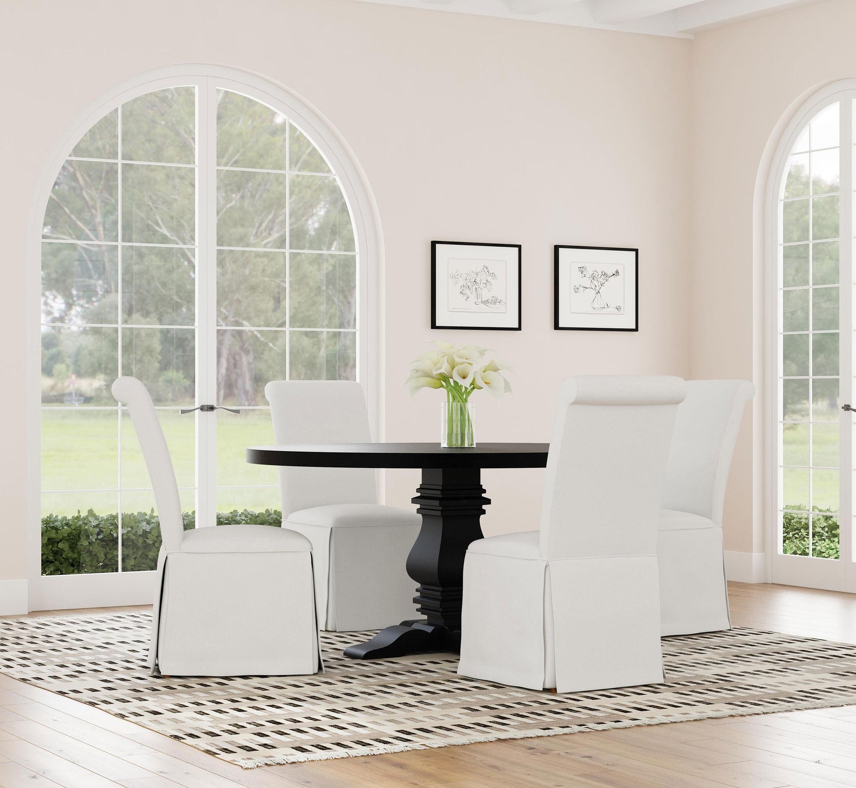 Florence round dining table displaying adjustable levelers
