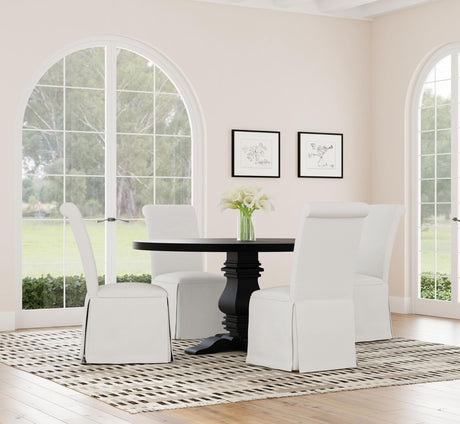 Florence round dining table displaying adjustable levelers
