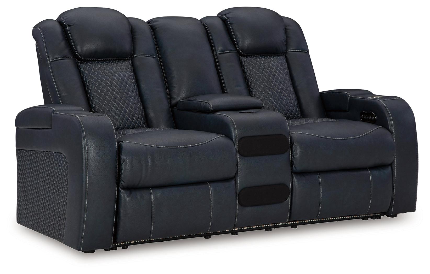 Fyne-Dyme Sapphire Faux Leather Power Reclining Loveseat with Console close-up of diamond stitching