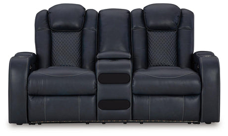 Power reclining loveseat with LED lighting on base