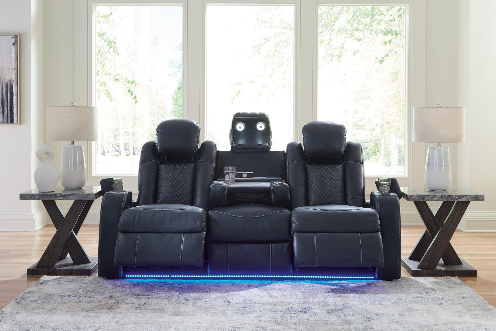 Blue ambient LED lighting under the base illuminating the floor