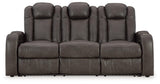 Armrest with flip-top storage and cup holder