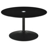 Ganso round metal coffee table with dark tempered glass top angled view