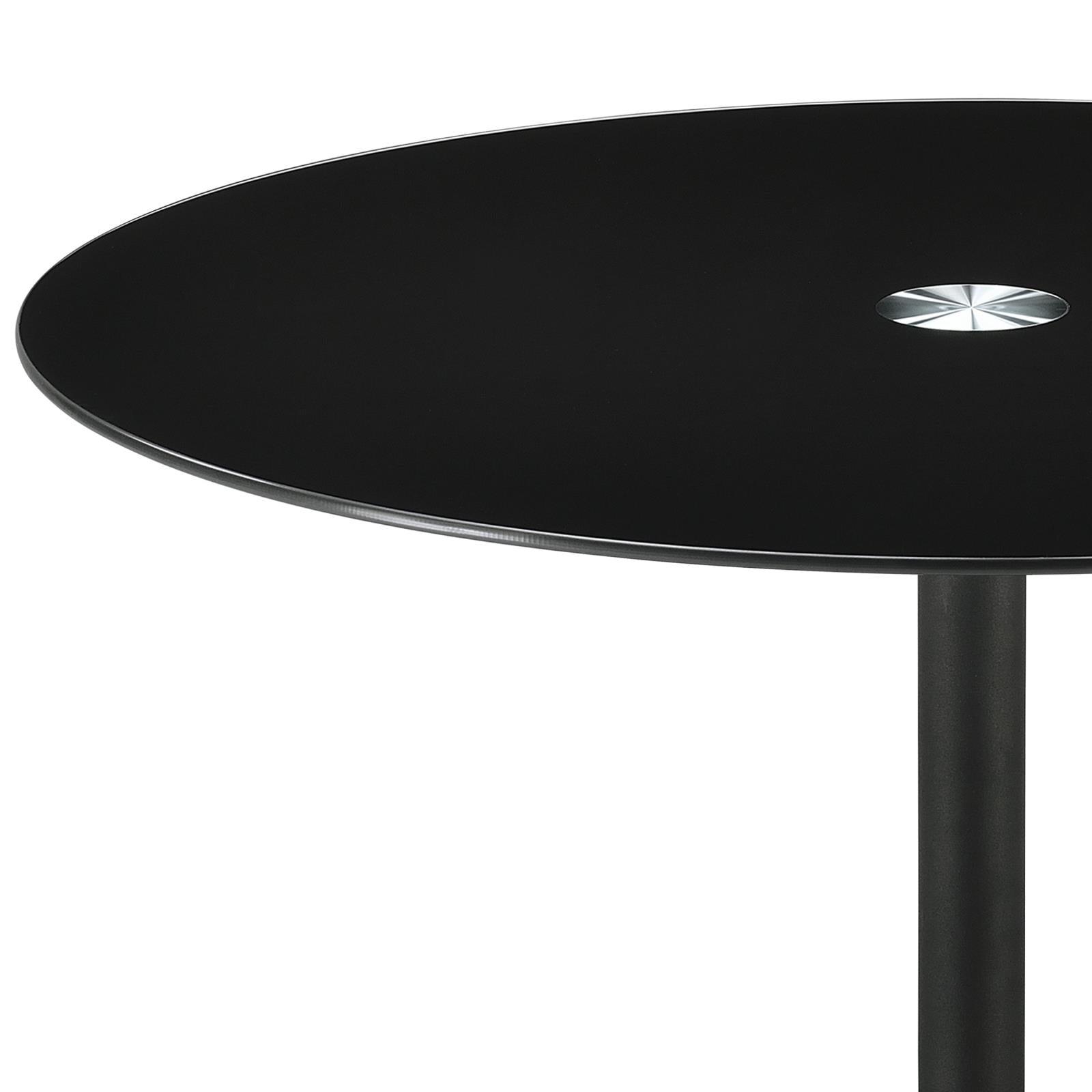 Close-up of black tempered glass top on Ganso table
