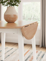 Dining setup featuring Gesthaven natural white drop leaf table