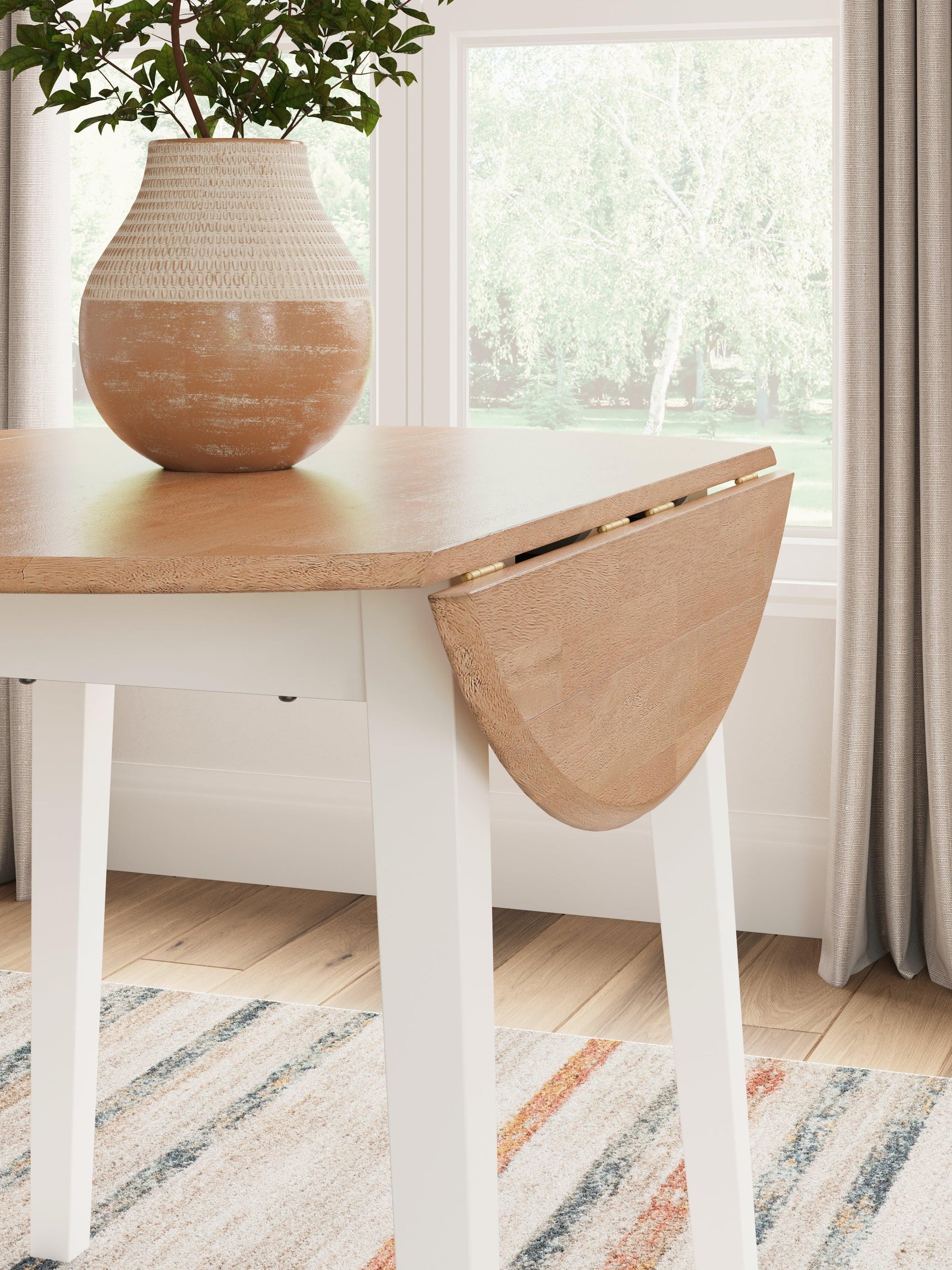 Dining setup featuring Gesthaven natural white drop leaf table