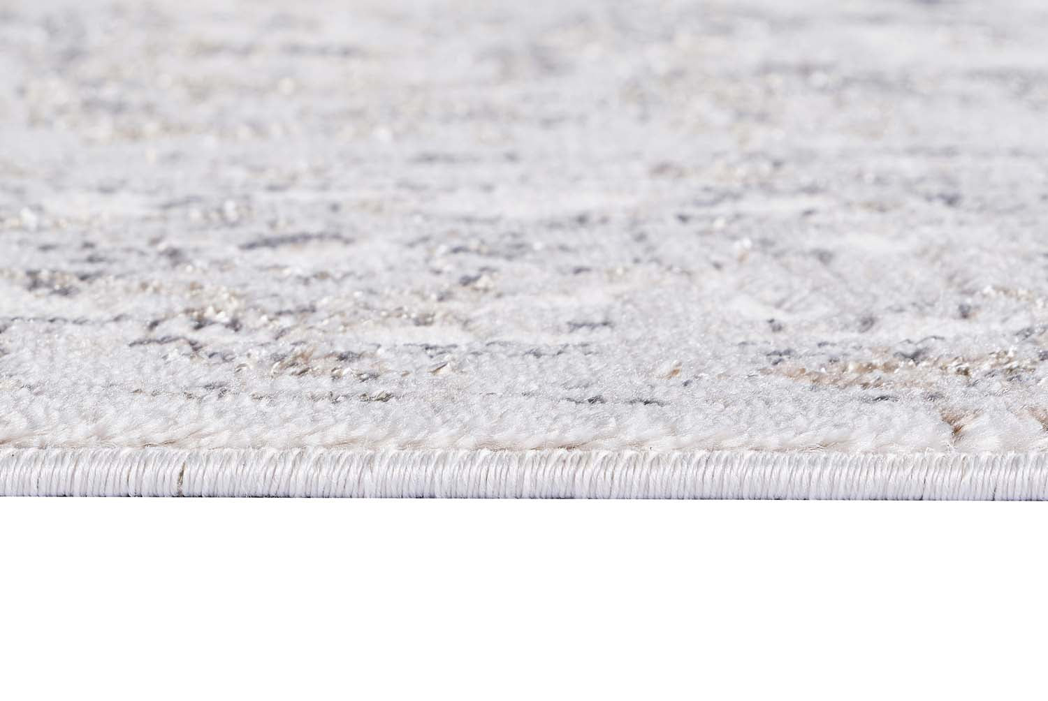 Glitz 712 area rug partially rolled