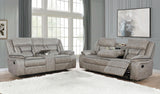 Greer taupe upholstered reclining sofa side view showing armrest and cupholder