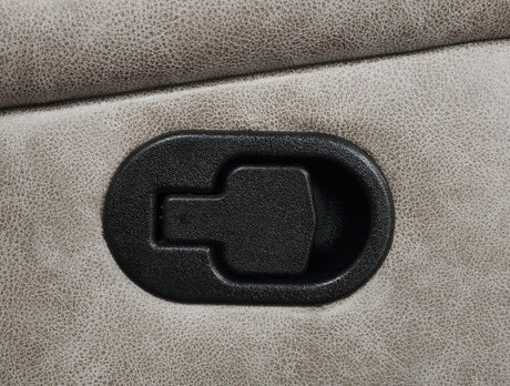 Detailed stitching on taupe upholstery, close-up