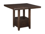 Top view of Haddigan dark brown dining table and barstools