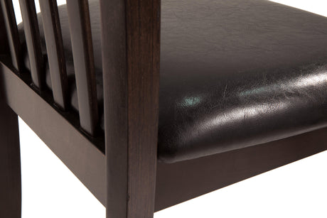 Close-up detail of Hammis Dark Brown Round Dining Room Set