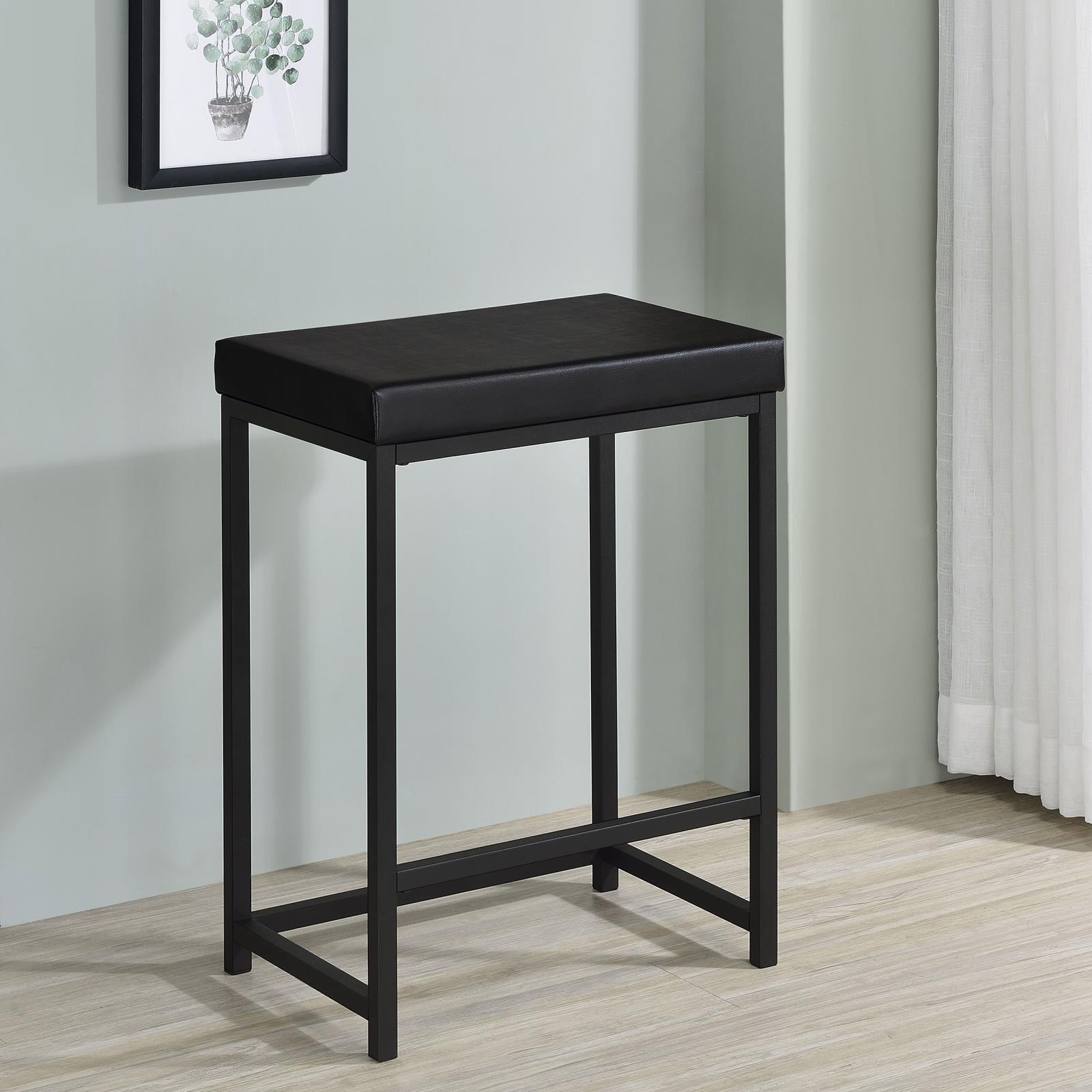 Stools showing footrests and seat height