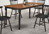 Hollyoak dining table walnut top and black base side view