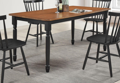 Hollyoak dining table walnut top and black base side view