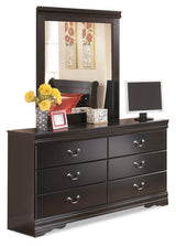 Bedroom view showing Huey Vineyard Black Sleigh Bedroom Set