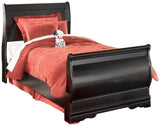 Side view highlighting bed’s sleigh curves