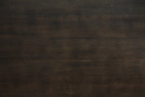 Close-up detail of crafted table surface and chair upholstery
