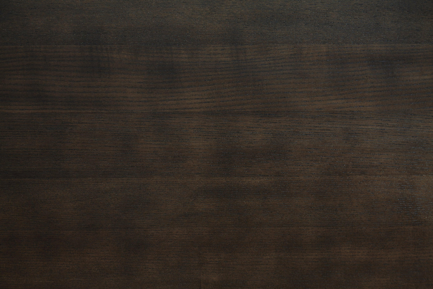 Close-up detail of crafted table surface and chair upholstery