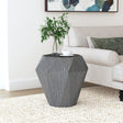 Side view of Jacinto Octagonal solid mango wood side table in grey