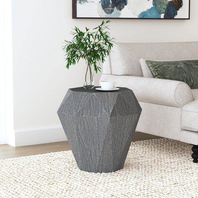 Side view of Jacinto Octagonal solid mango wood side table in grey