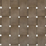Jameset Taupe leather accent chair angled in living room setup