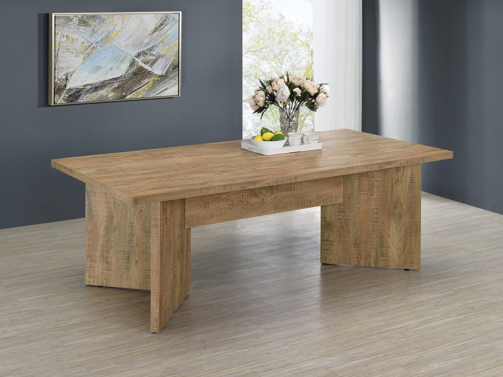 Side view of Jamestown rectangular mango brown dining table with V-shaped pedestal