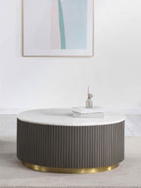 Jason Round marble coffee table showing metal frame and marble surface