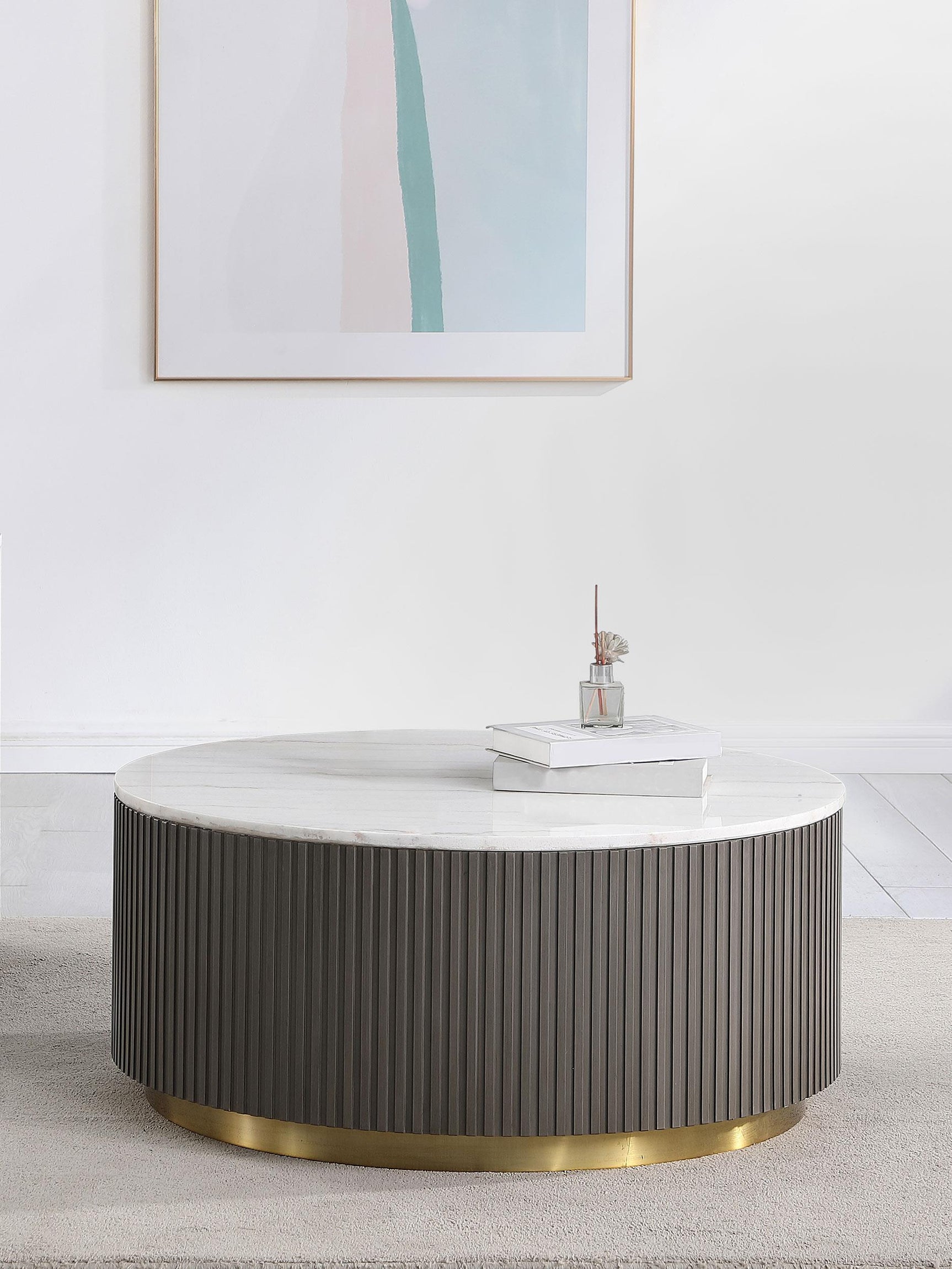 Jason Round marble coffee table showing metal frame and marble surface