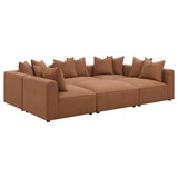 Close-up detail of sofa cushions showing terracotta fabric