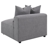 Jennifer grey upholstered armless chair scatter pillows detail