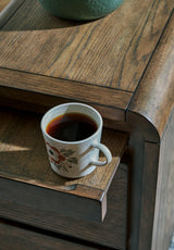 Jensworth Brown Accent Table curved edge detail