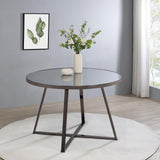 Jillian round dining table angled view highlighting geometric metal supports